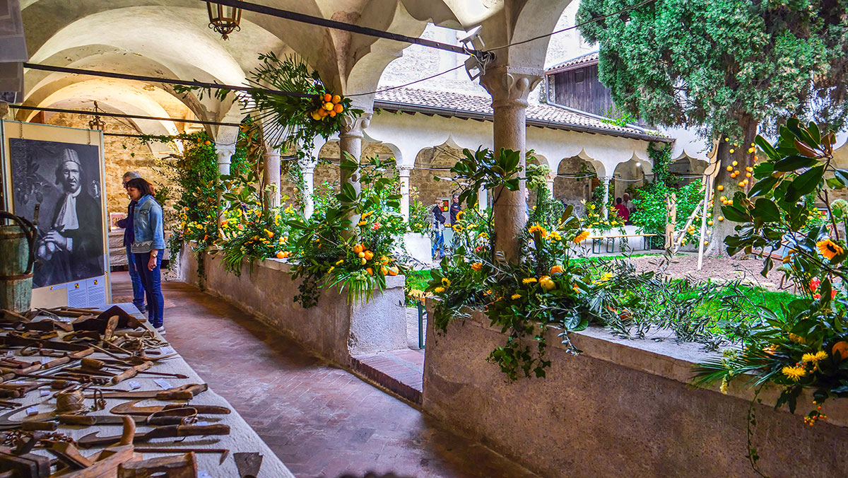 Cloister decorated with citrus fruits and plants for the Giardini d'Agrumi event in Gargnano on Lake Garda.